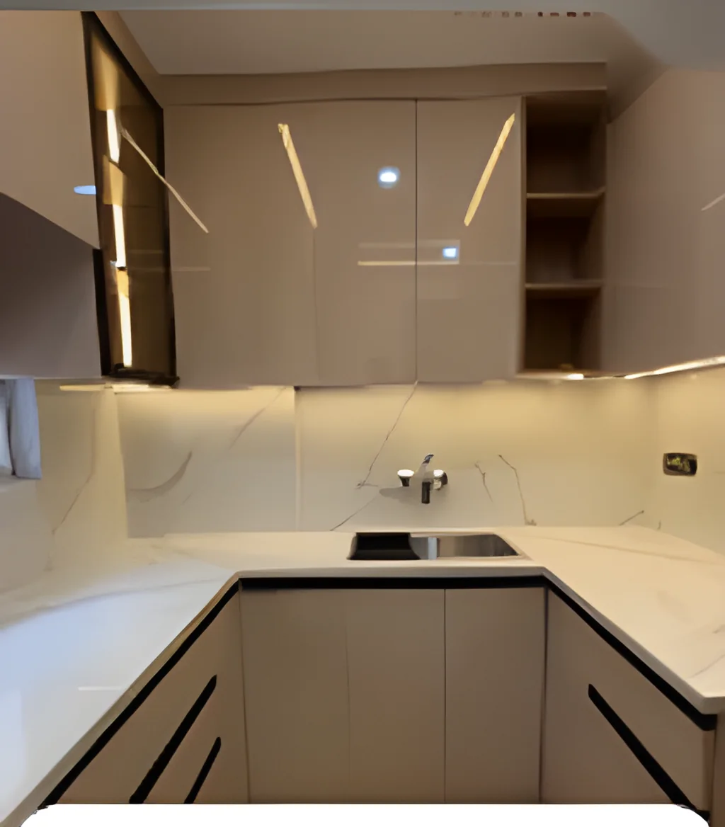 Modular kitchen in taupe with a stone counter, tall units and cove lighting