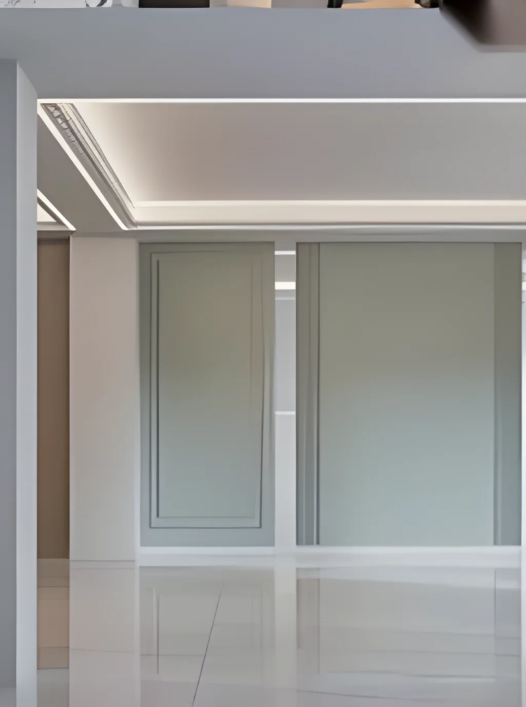 Room with a cove-lit false ceiling, glazed partition doors and polished flooring